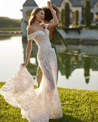 Elysia By Rosa Clara Price Range: $2999.99 - $7750.00 $2 default Natural thumbnail