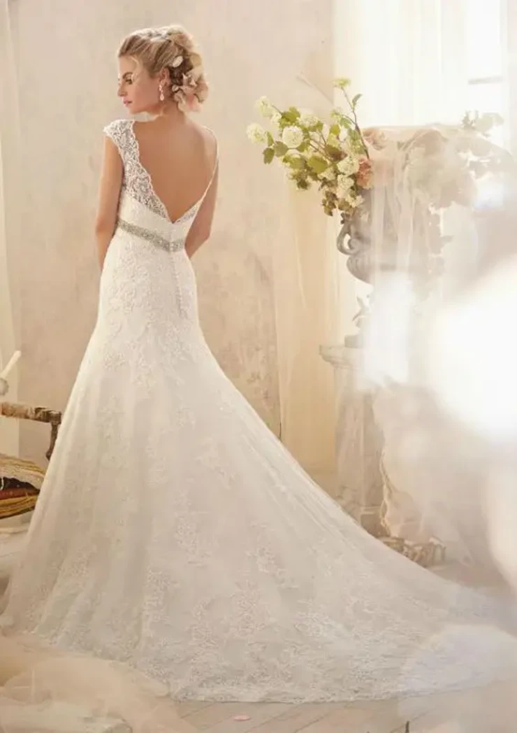 Marlie By Morilee Price Range: $2200.00 - $5285.00 #1 Ivory/Silver picture