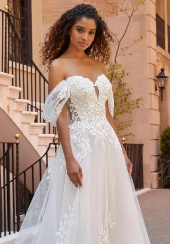 Jeanette By Morilee Price Range: $2200.00 - $5285.00 $3 Ivory/Porcelain thumbnail