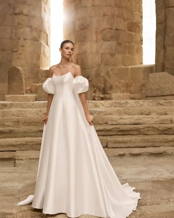 Pomelo By Rosa Clará Wedding Gowns Price Range: $2999.99 - $7750.00 $1 Natural thumbnail