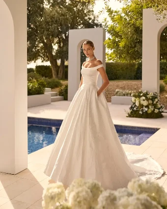 Nupcia By Rosa Clará Wedding Gowns Price Range: $2999.99 - $7750.00 $2 Natural thumbnail